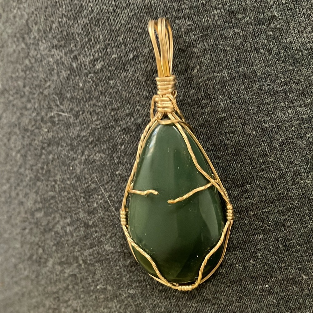 Ladies wire wrapped stone pendant